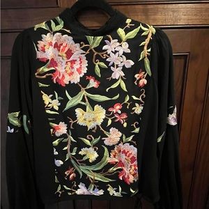 Tiny black blouse with beautiful embroidery detail
NWT
Size S